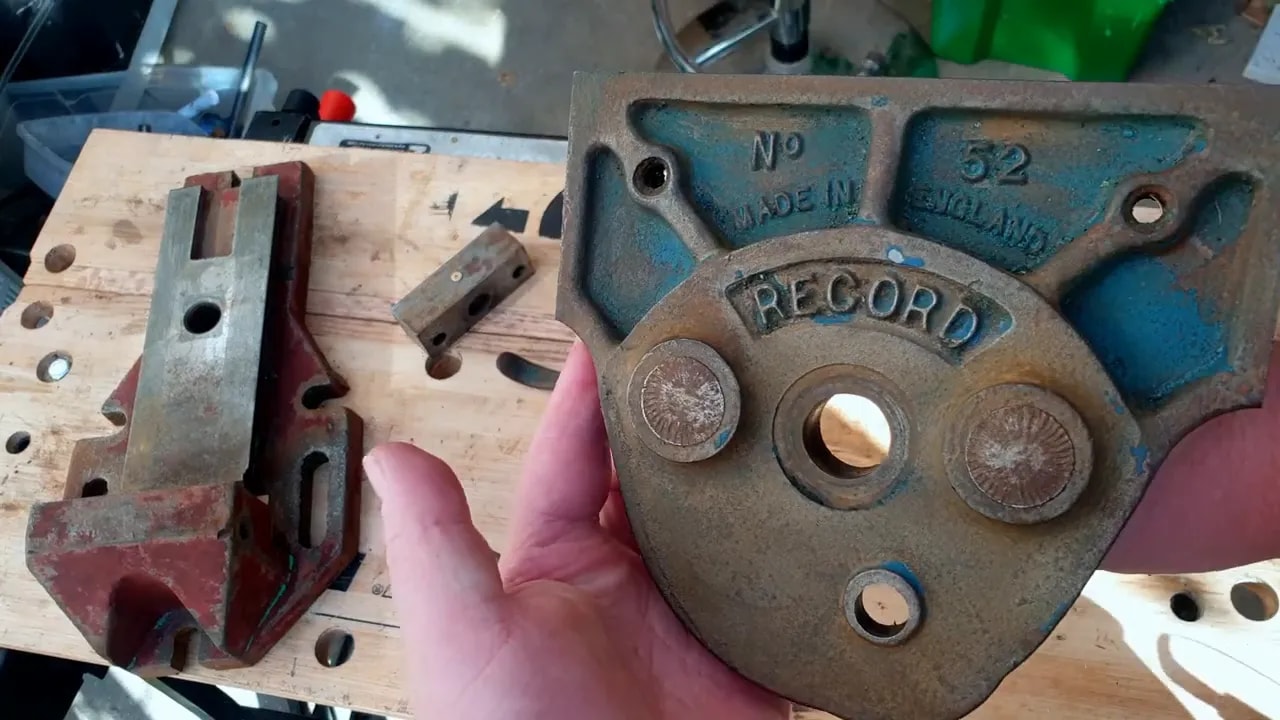 Cleaned Record vice front plate held up close to the camera